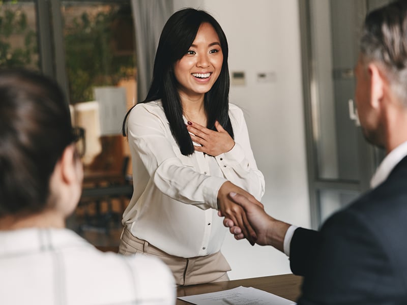 Young woman getting hired