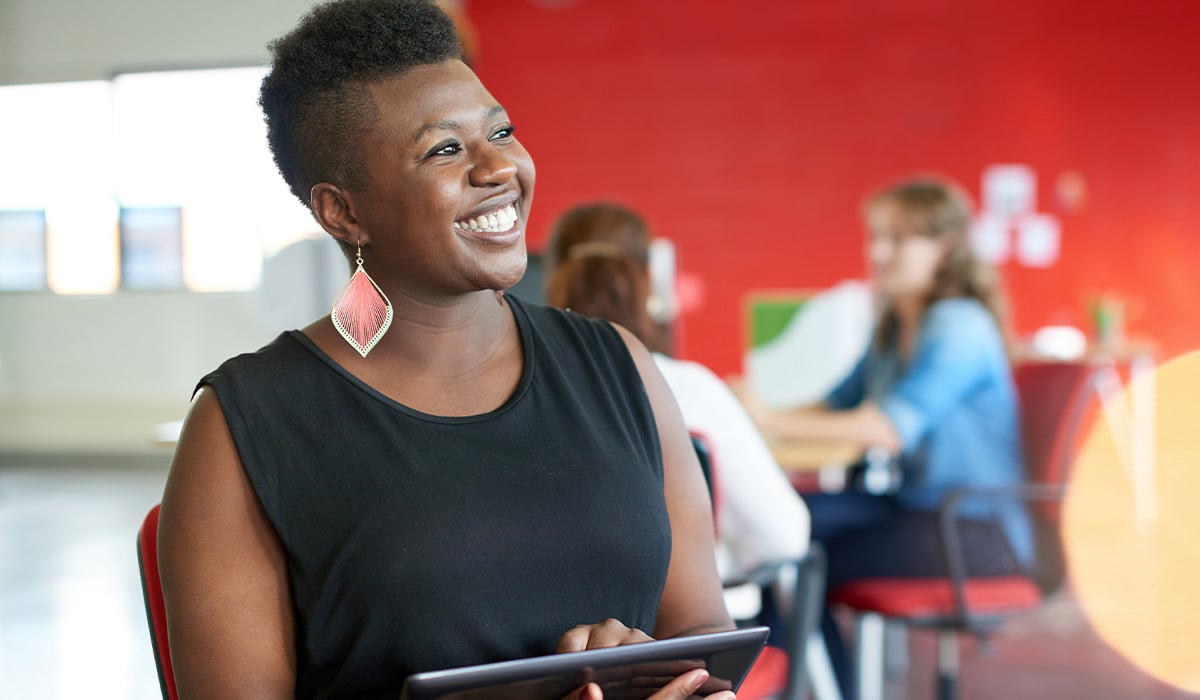 Business woman using tablet in office