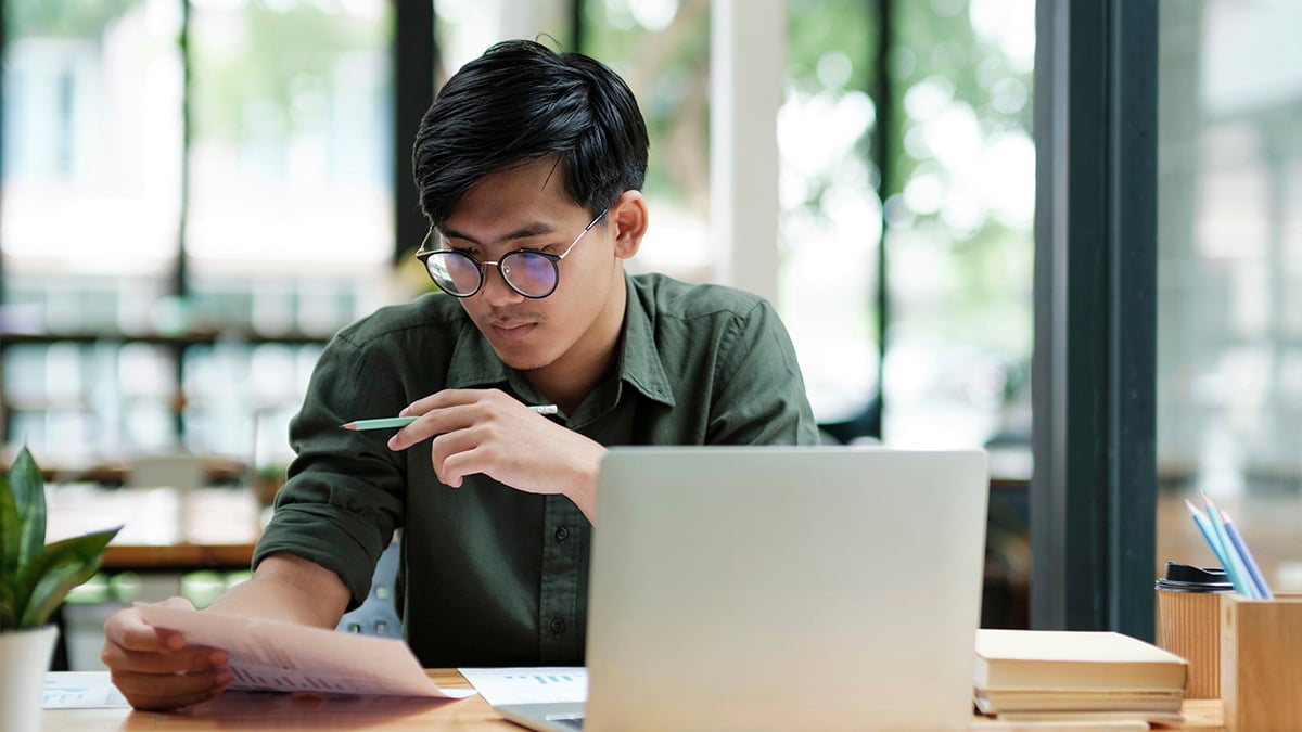 Man analyzing results in office