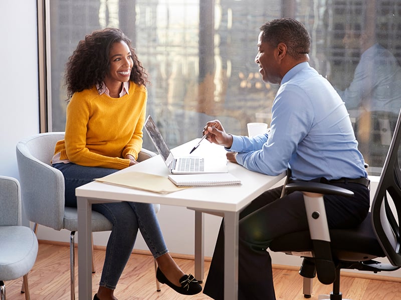 Woman meeting with financial advisor