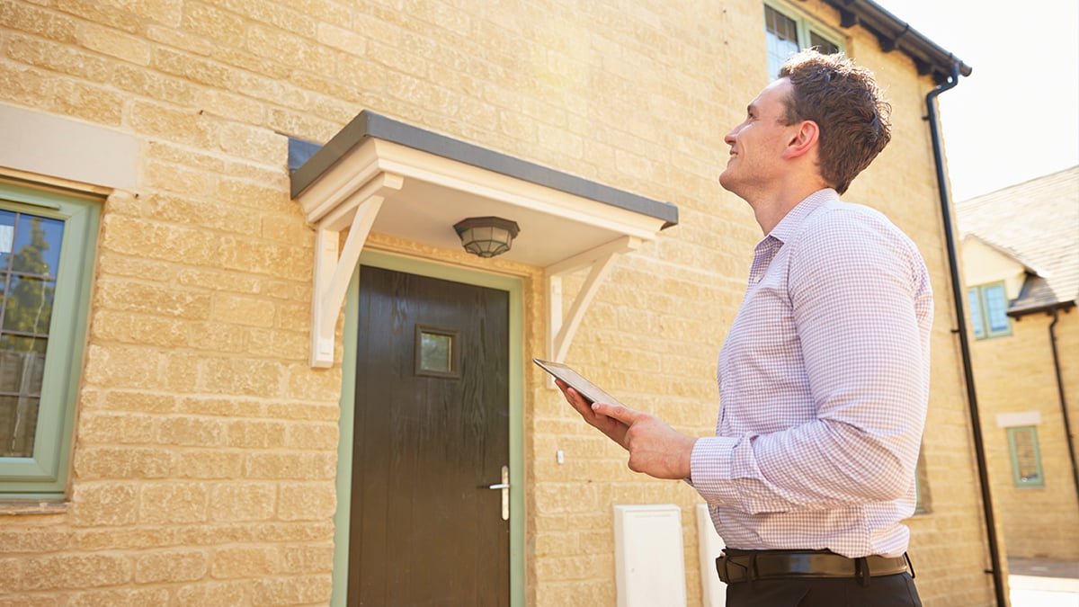 Man examining real estate assets