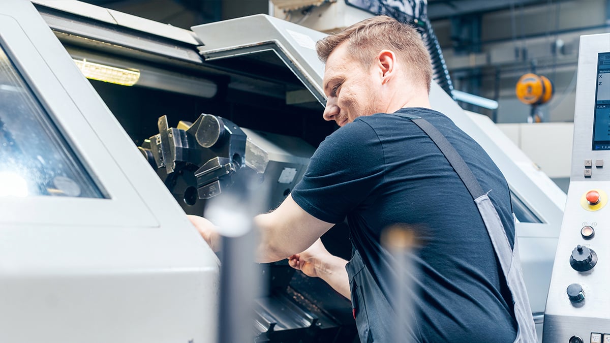 Worker using large machine