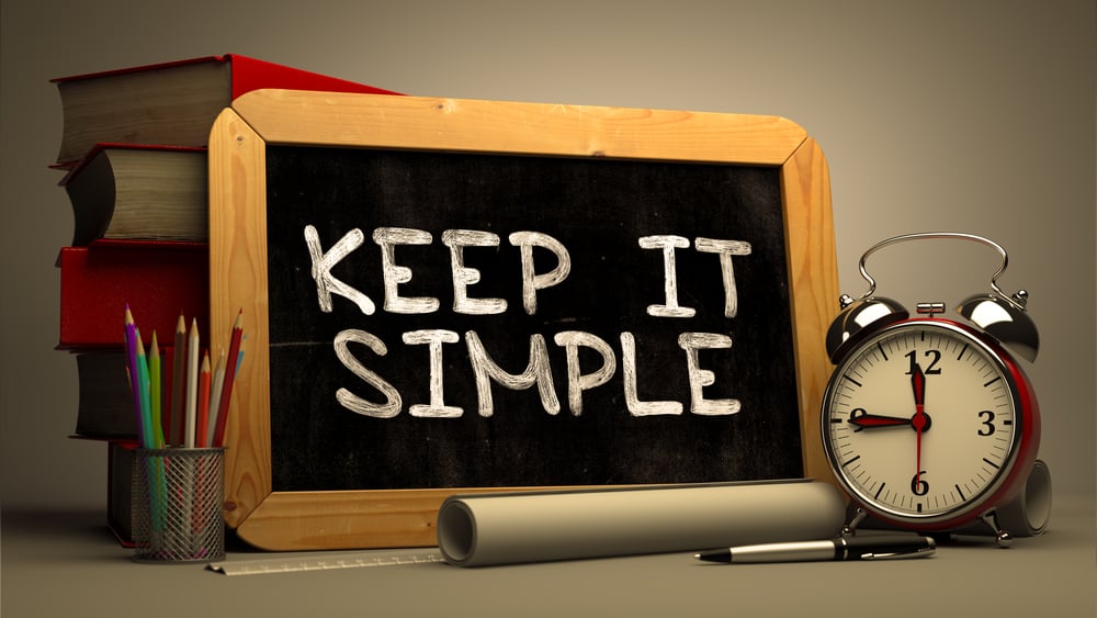 Hand Drawn Keep It Simple Concept on Chalkboard. Blurred Background. Toned Image.